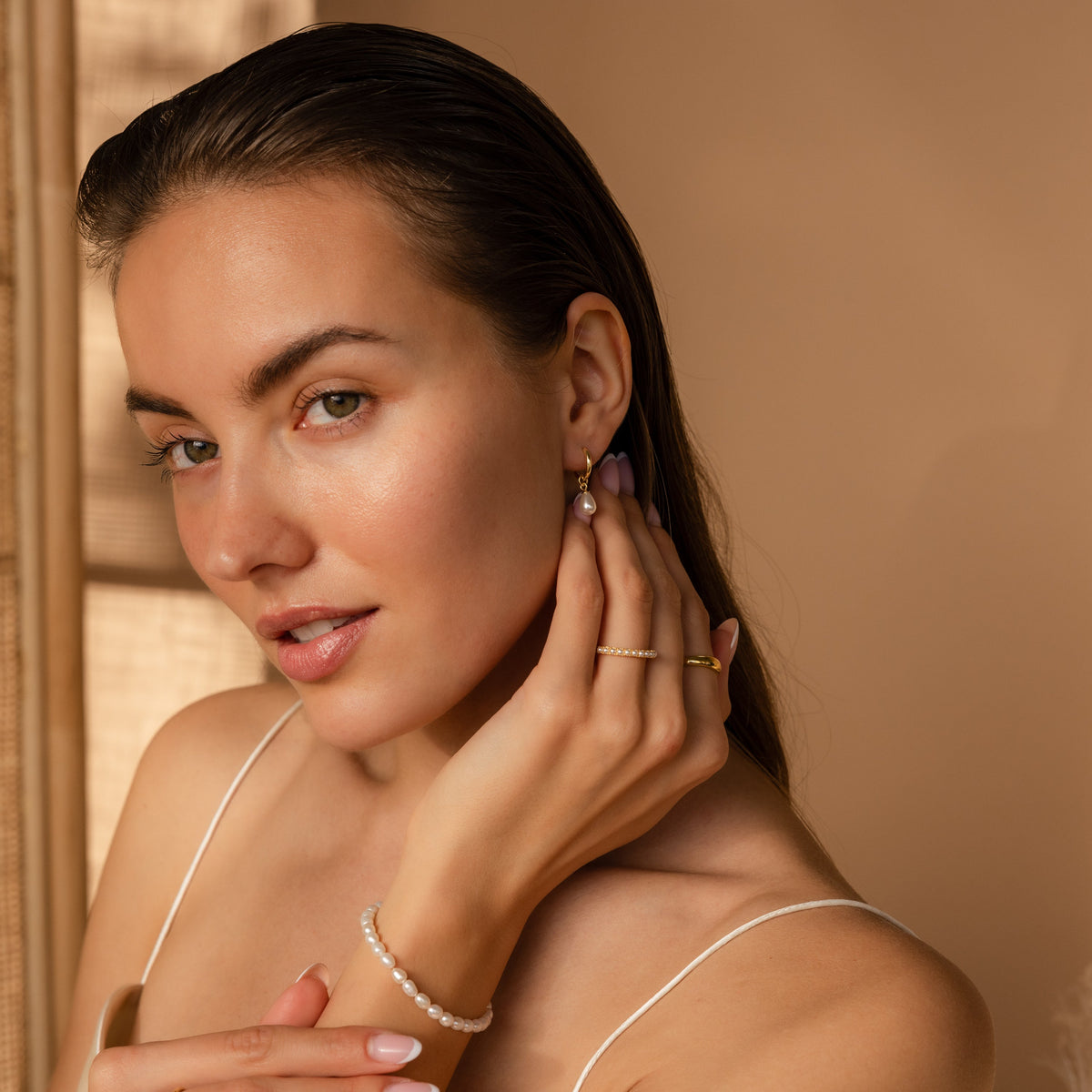 Dainty pearl drop huggies