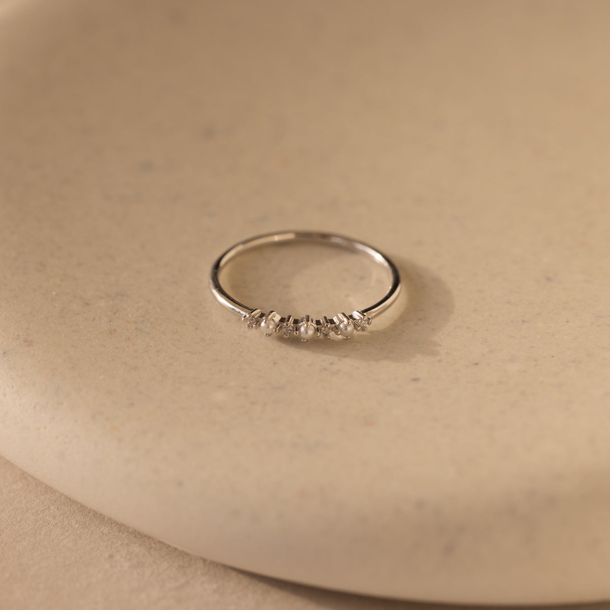 Delicate pearl diamond ring