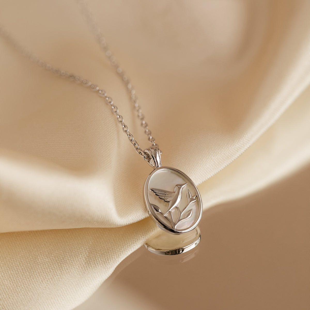 Pearl hummingbird necklace