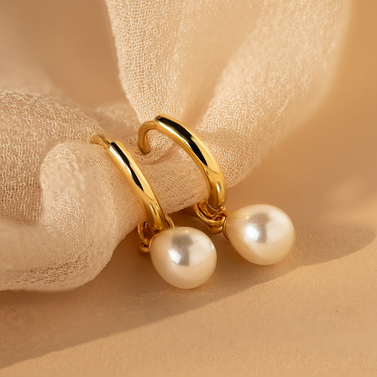 Dainty pearl drop huggies