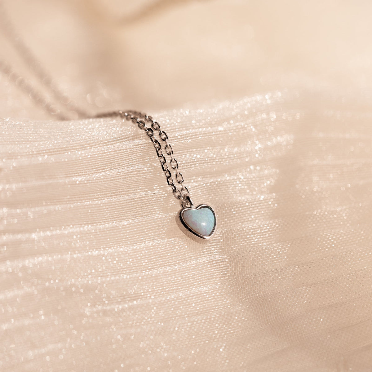 Tiny opal heart necklace