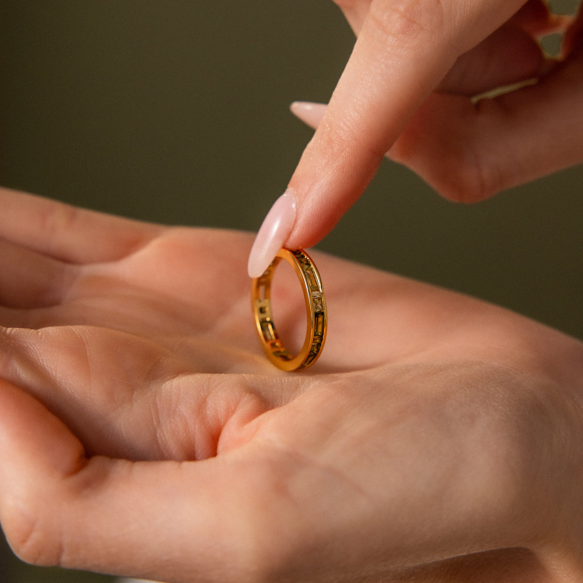 Peridot inlay eternity ring