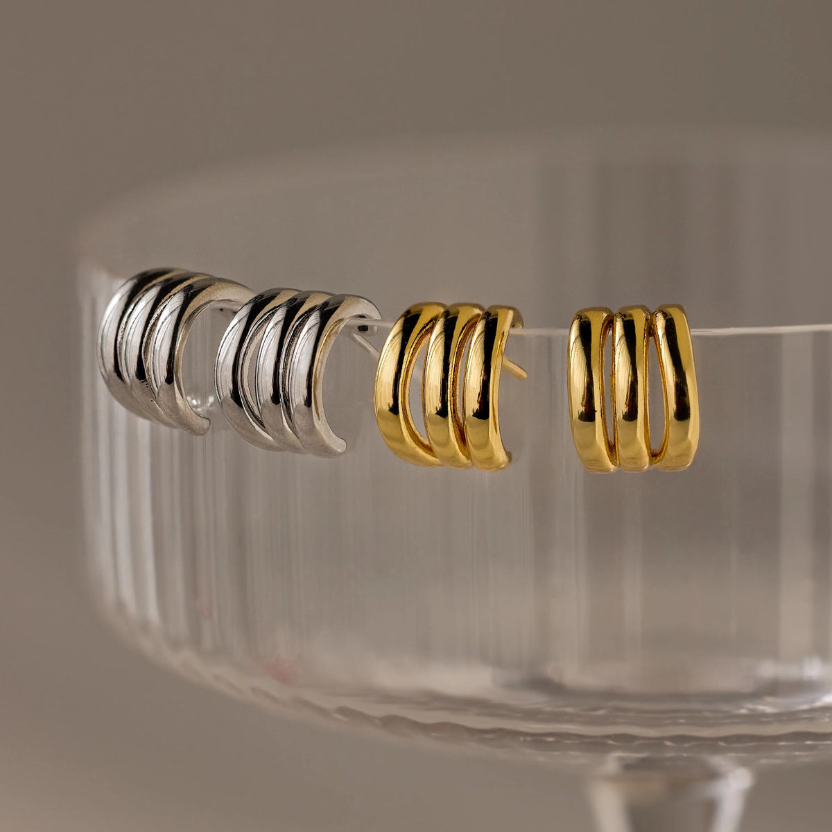 Triple loop huggie earrings