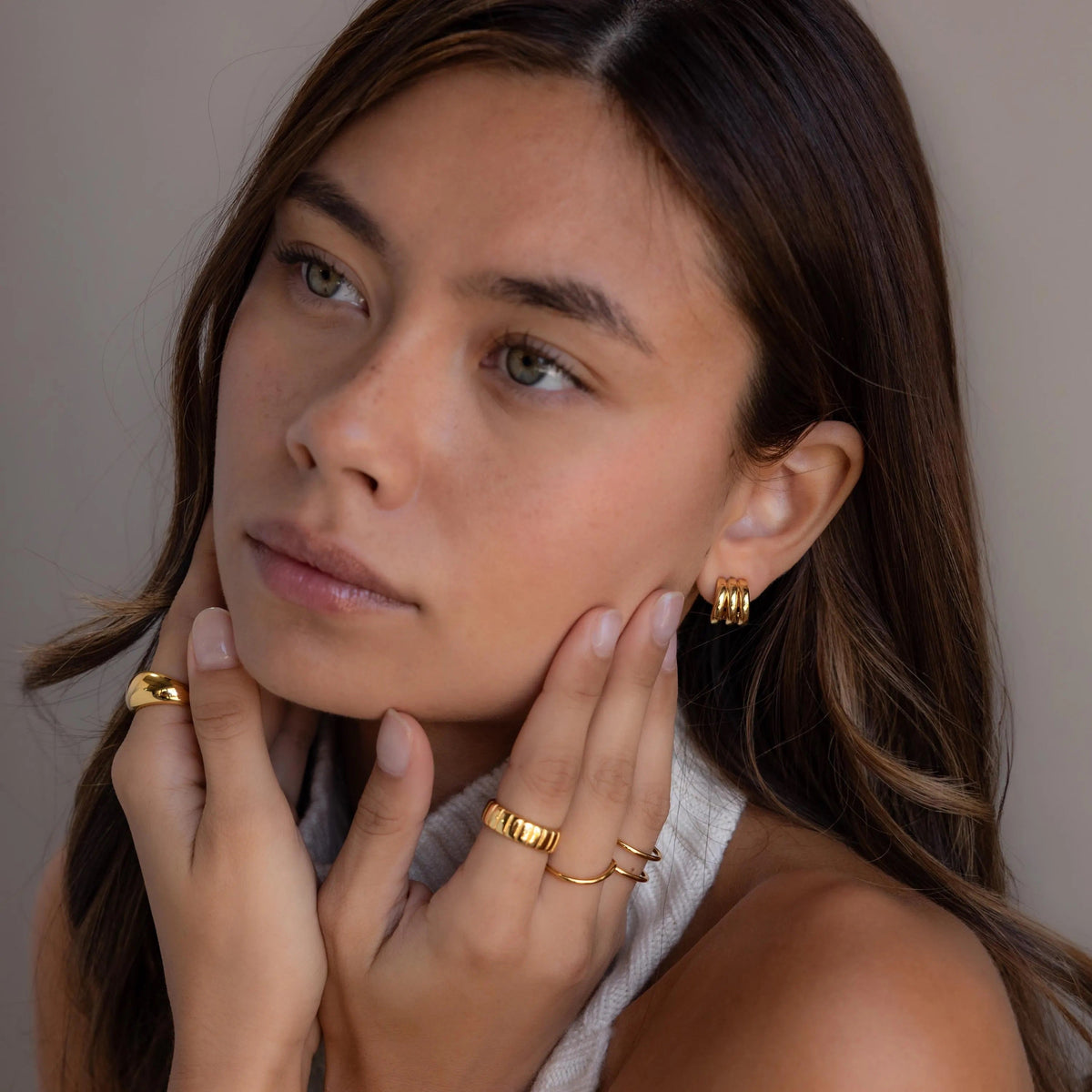 Triple loop huggie earrings
