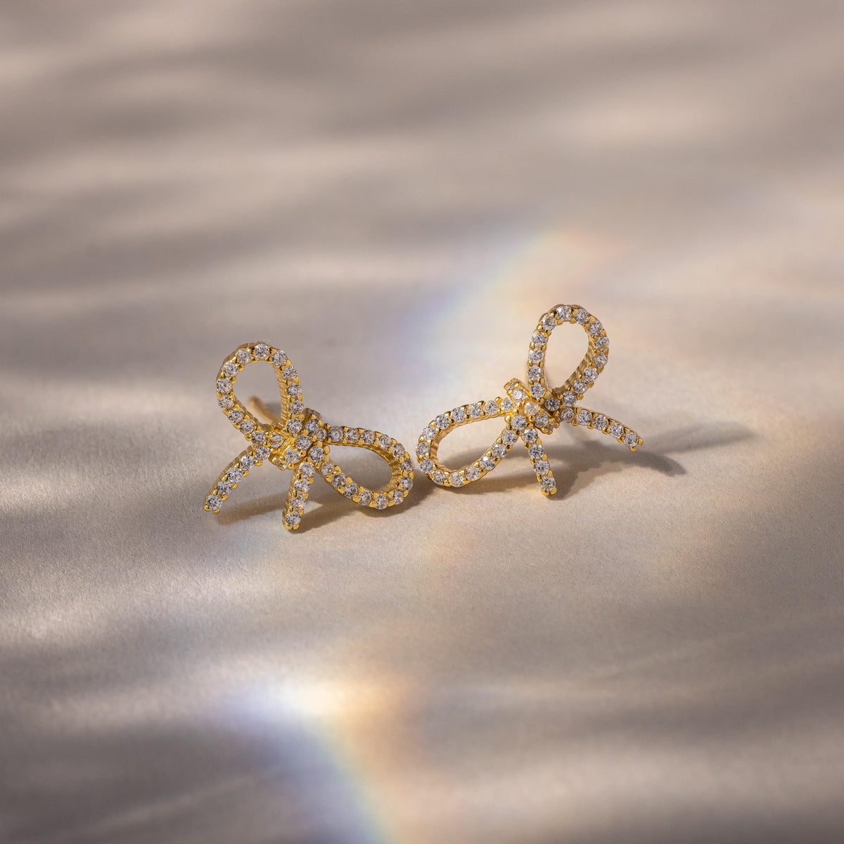 Pave bow studs 2