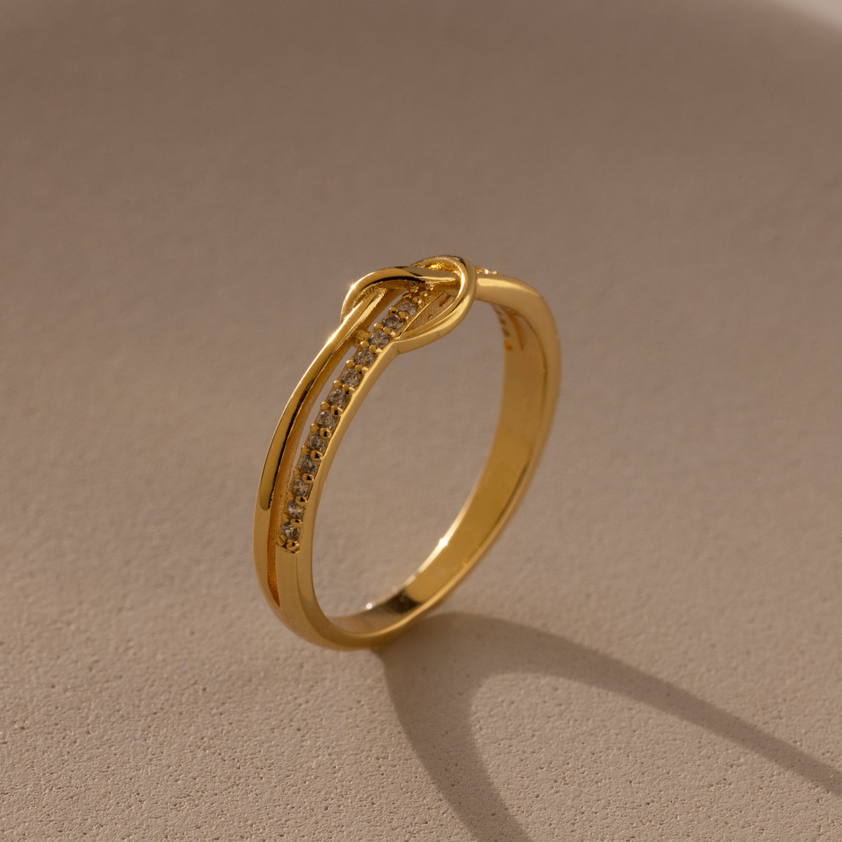 Pave knot ring