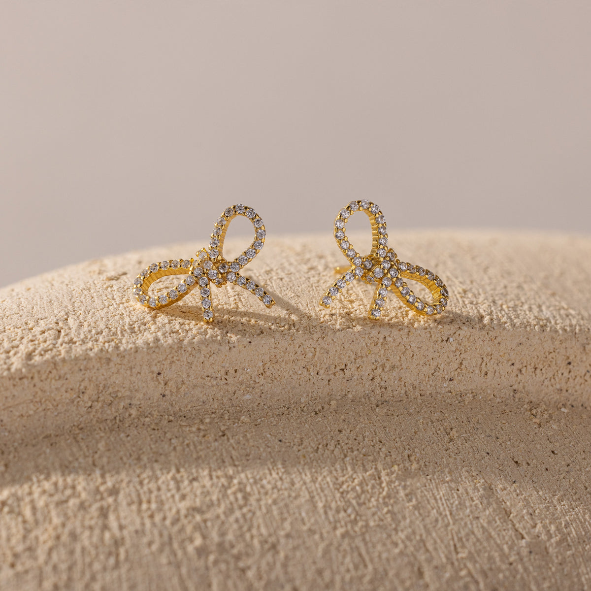 Pave bow studs 1