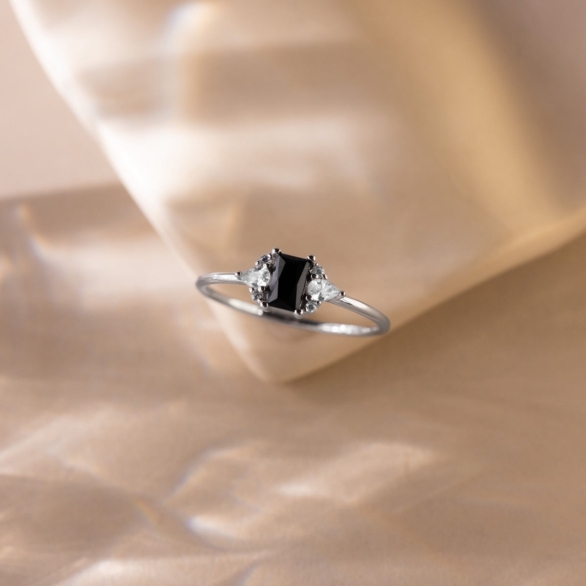 Black baguette diamond ring