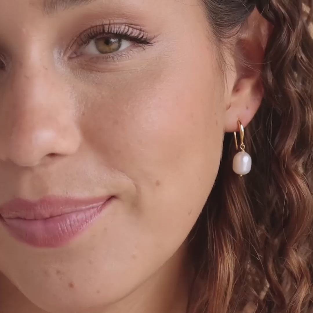 Dangling pearl drop earrings