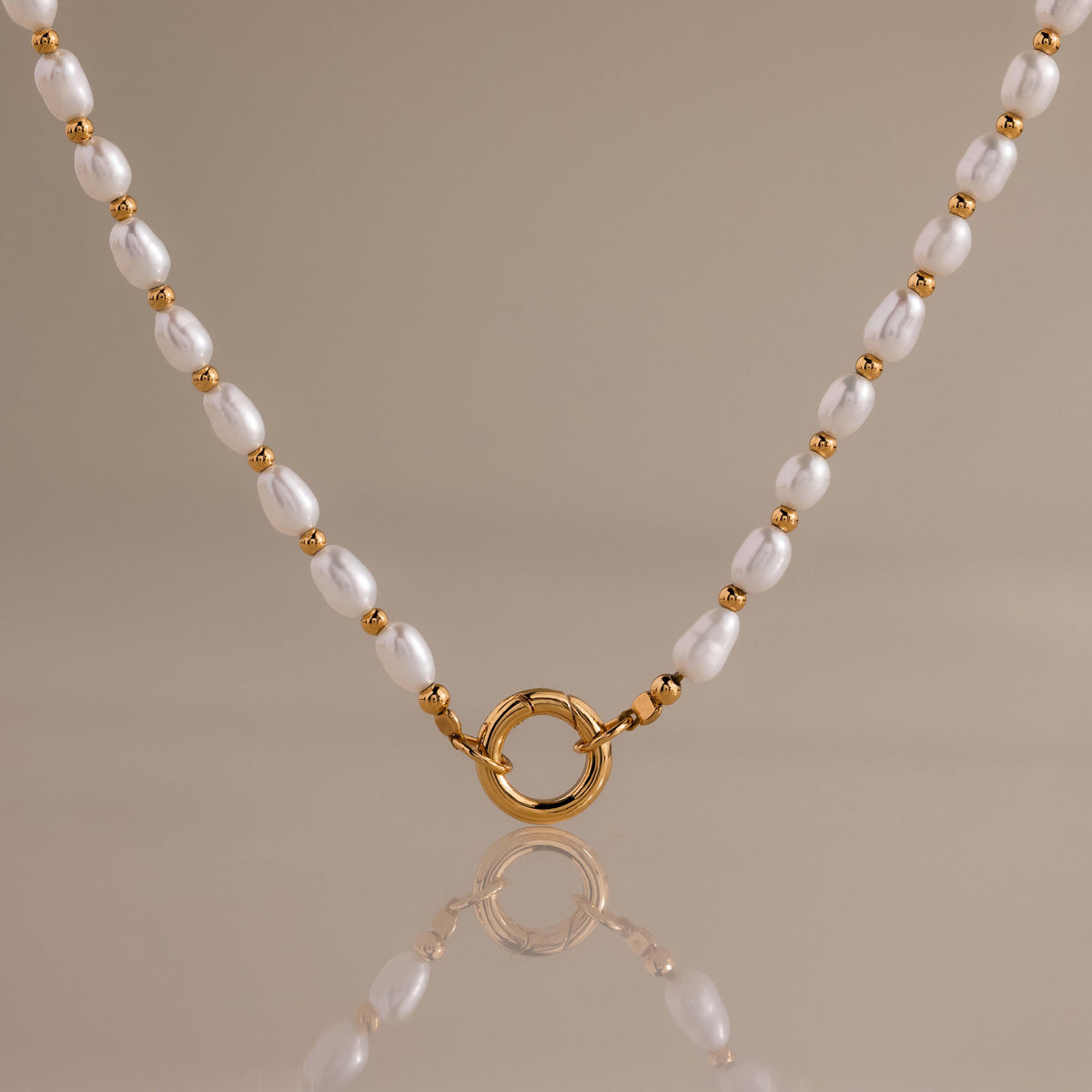 Pearl station beaded charm necklace
