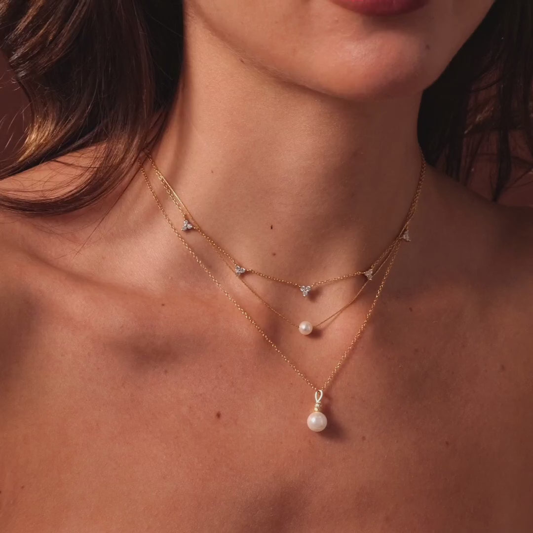 Diamond halo pearl necklace
