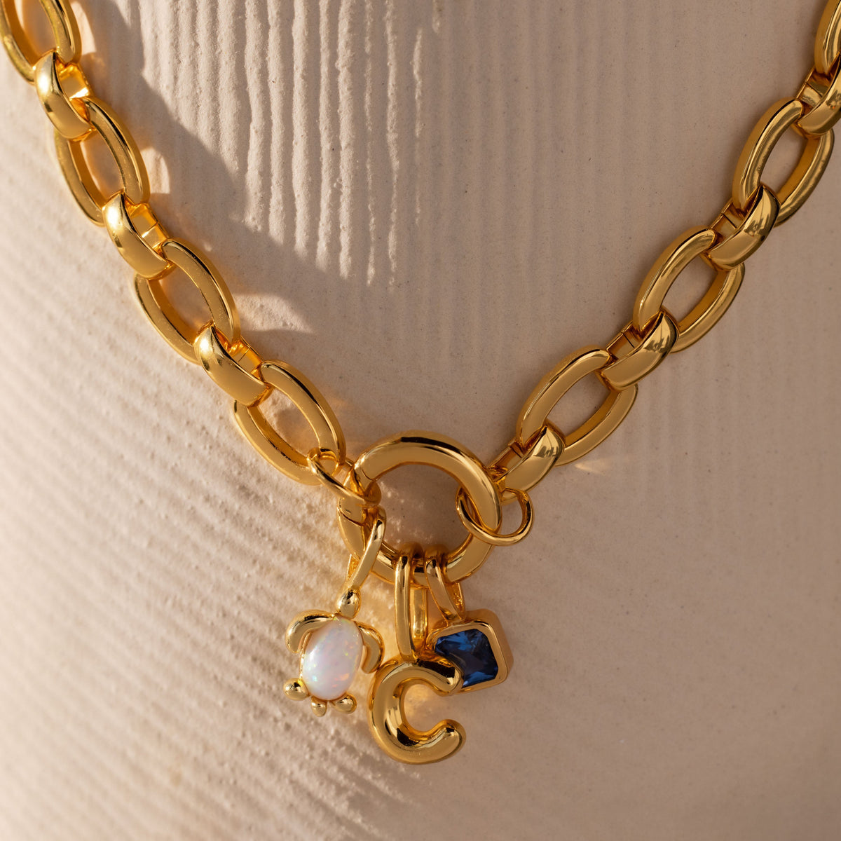 Oval link charm necklace