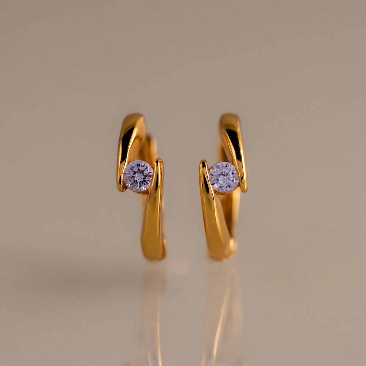 Floating birthstone huggies
