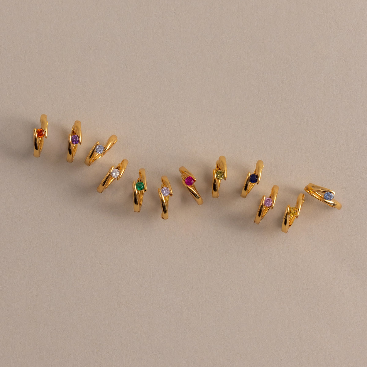 Floating birthstone huggies