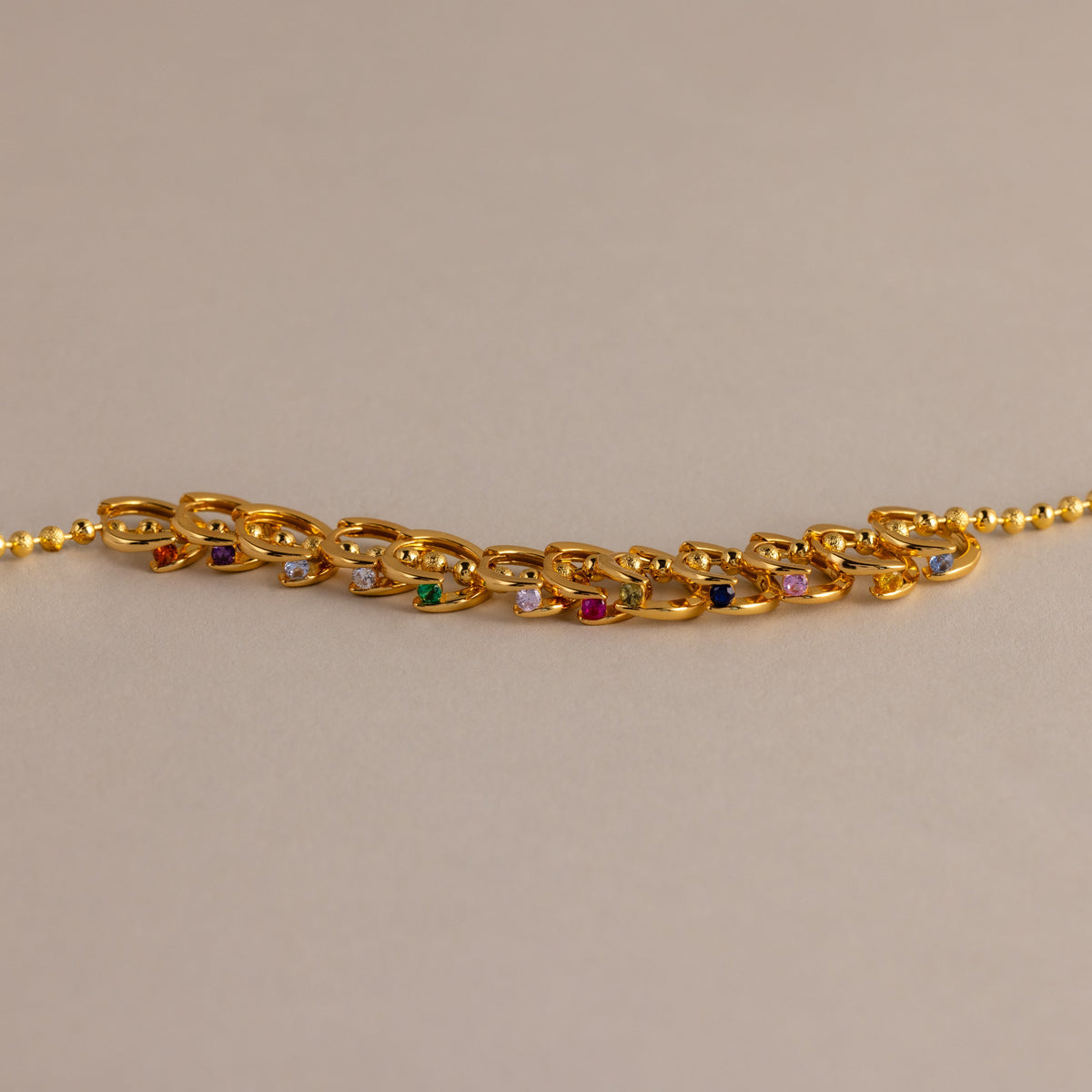 Floating birthstone huggies