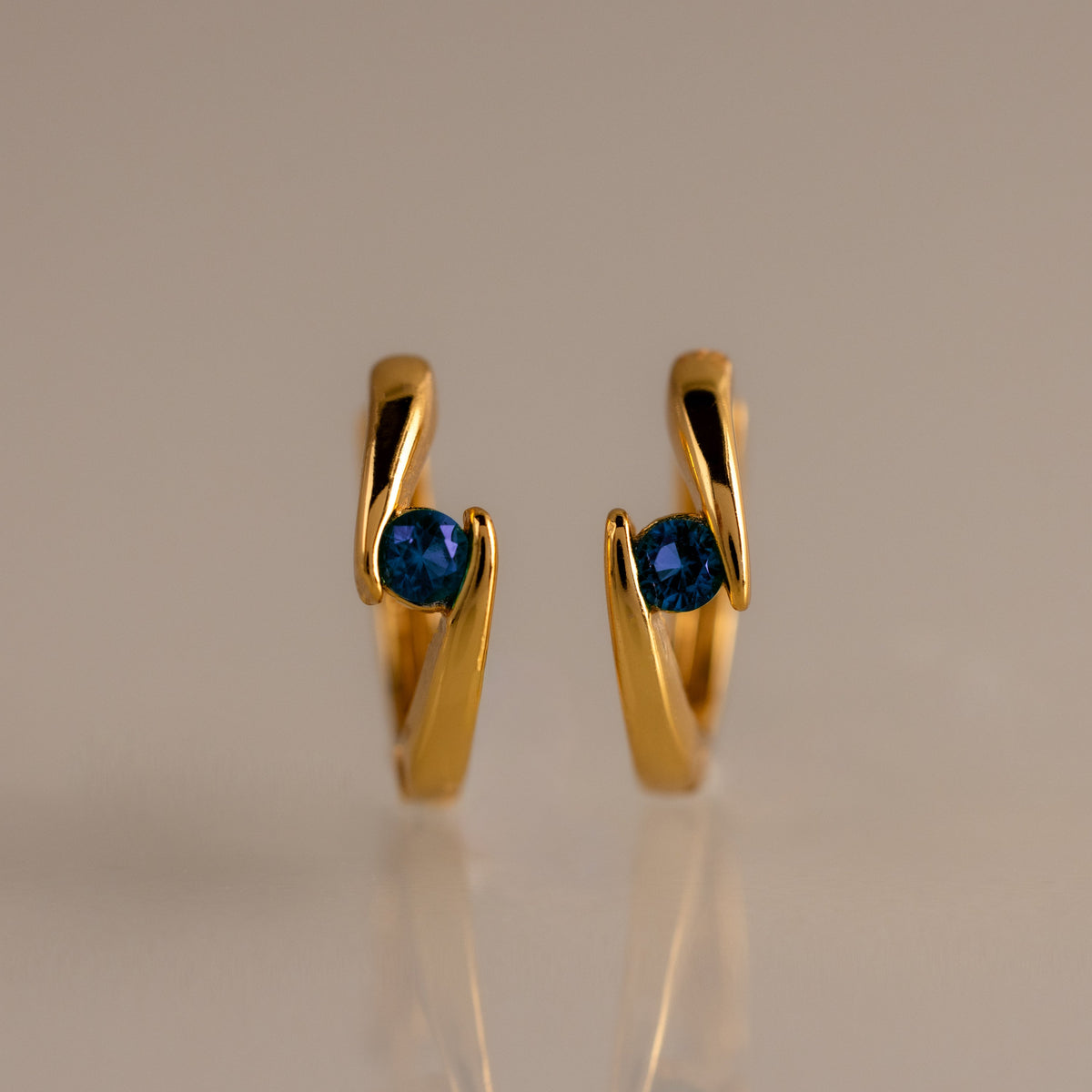 Floating birthstone huggies
