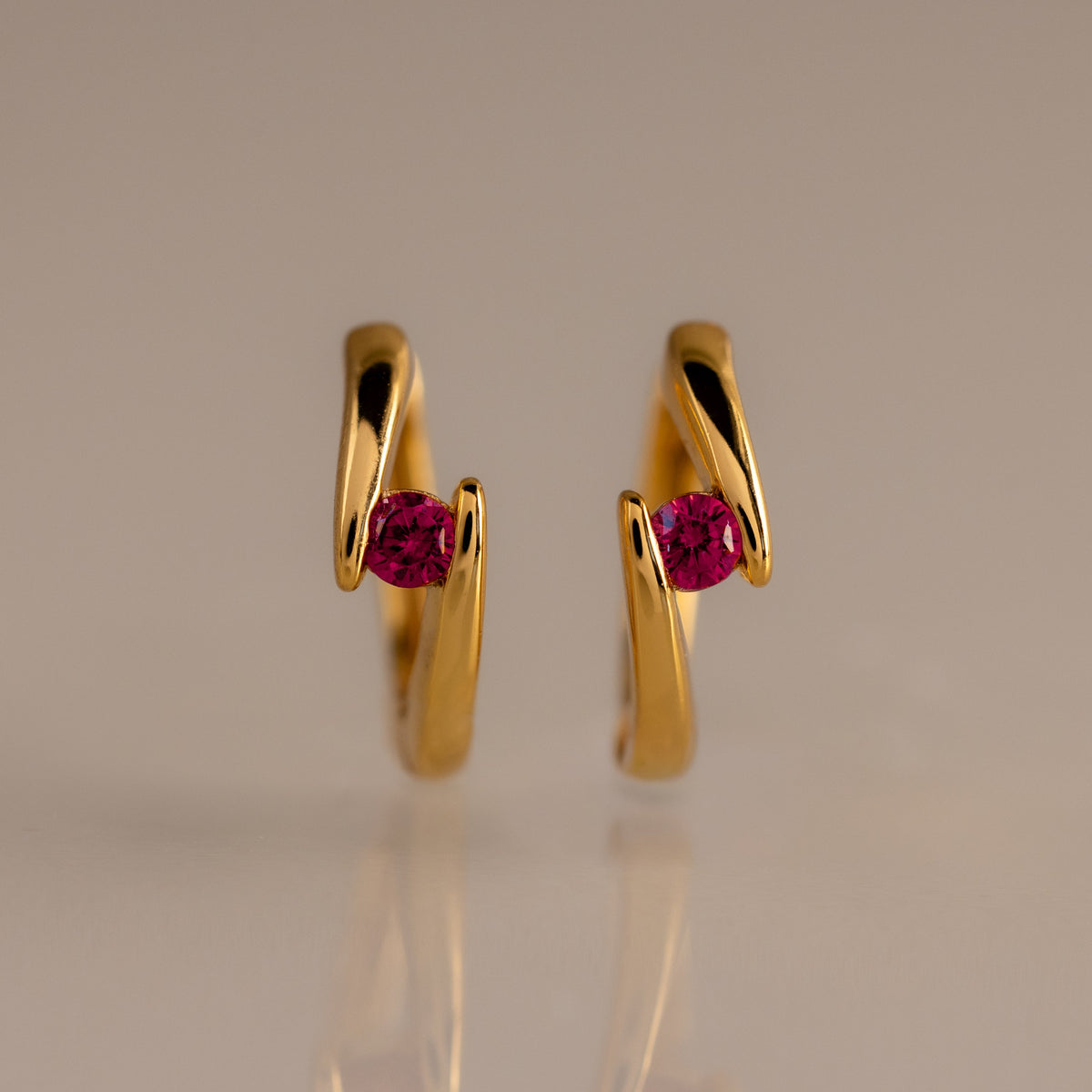 Floating birthstone huggies