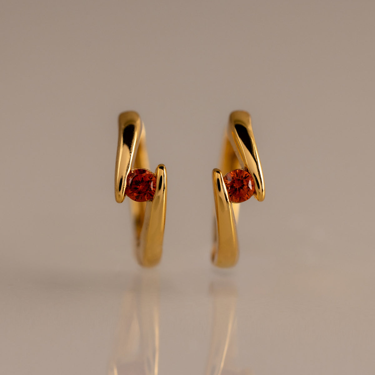Floating birthstone huggies