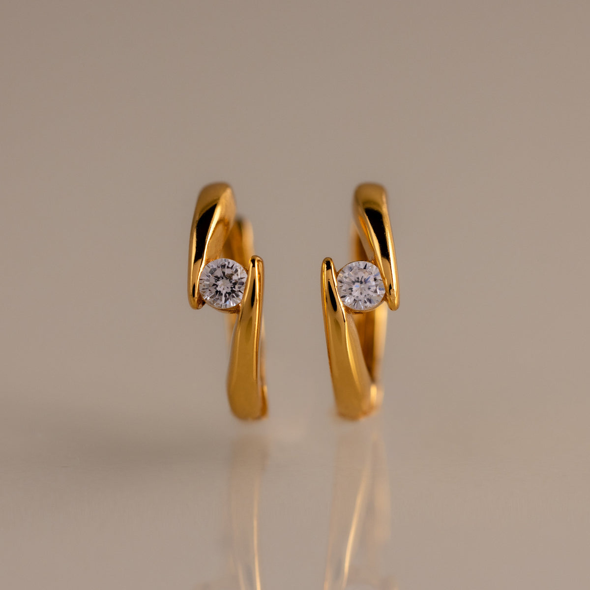 Floating birthstone huggies