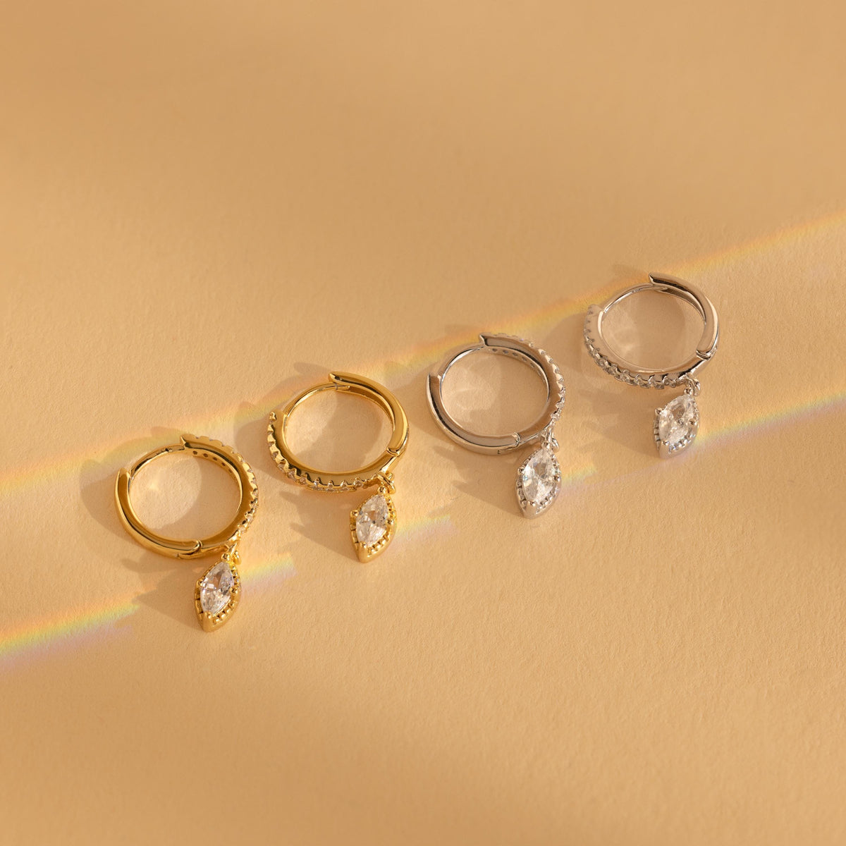 Marquise pave drop huggies