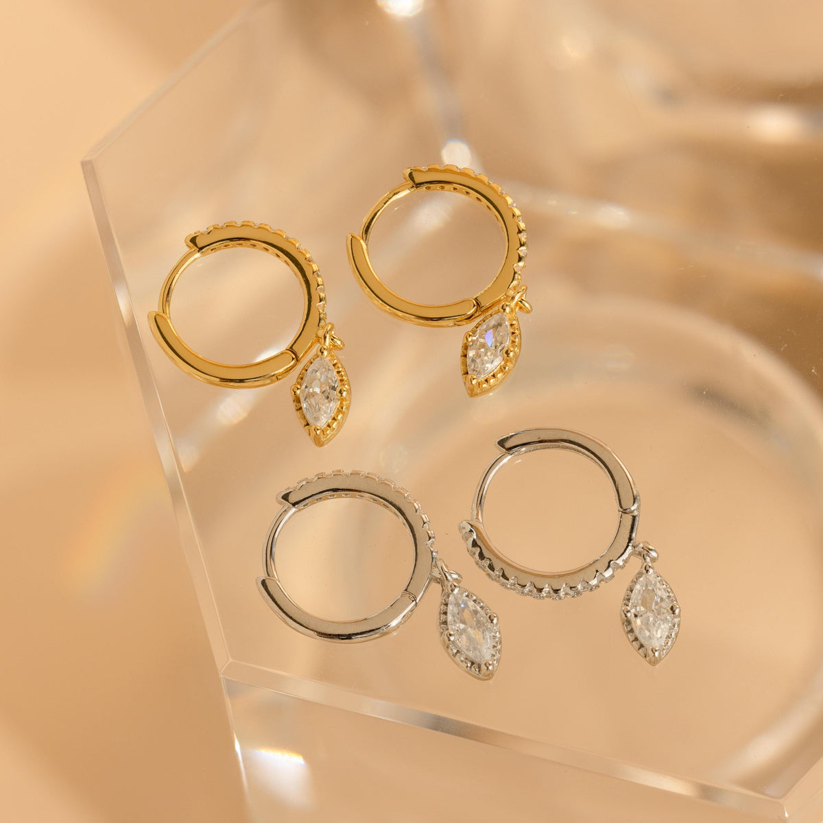 Marquise pave drop huggies