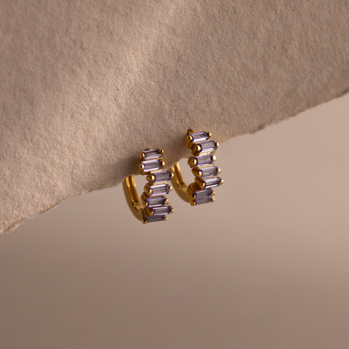 Staggered baguette birthstone huggies