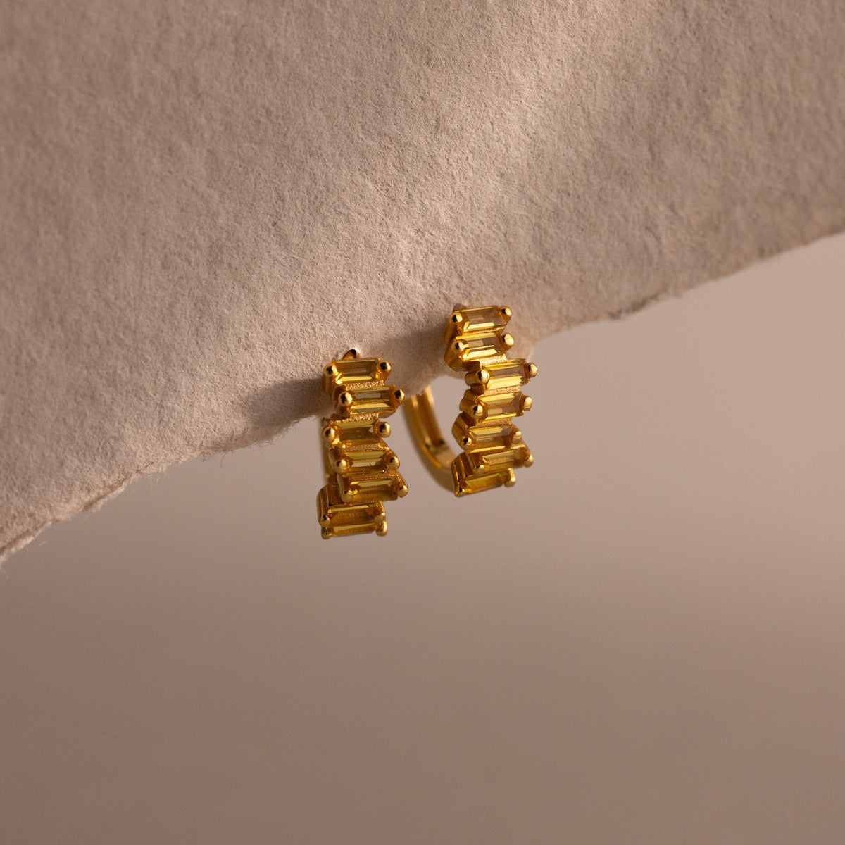 Staggered baguette birthstone huggies