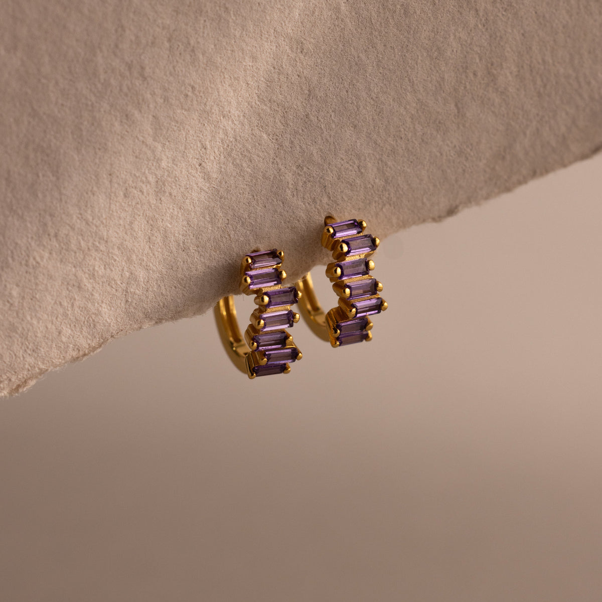 Staggered baguette birthstone huggies