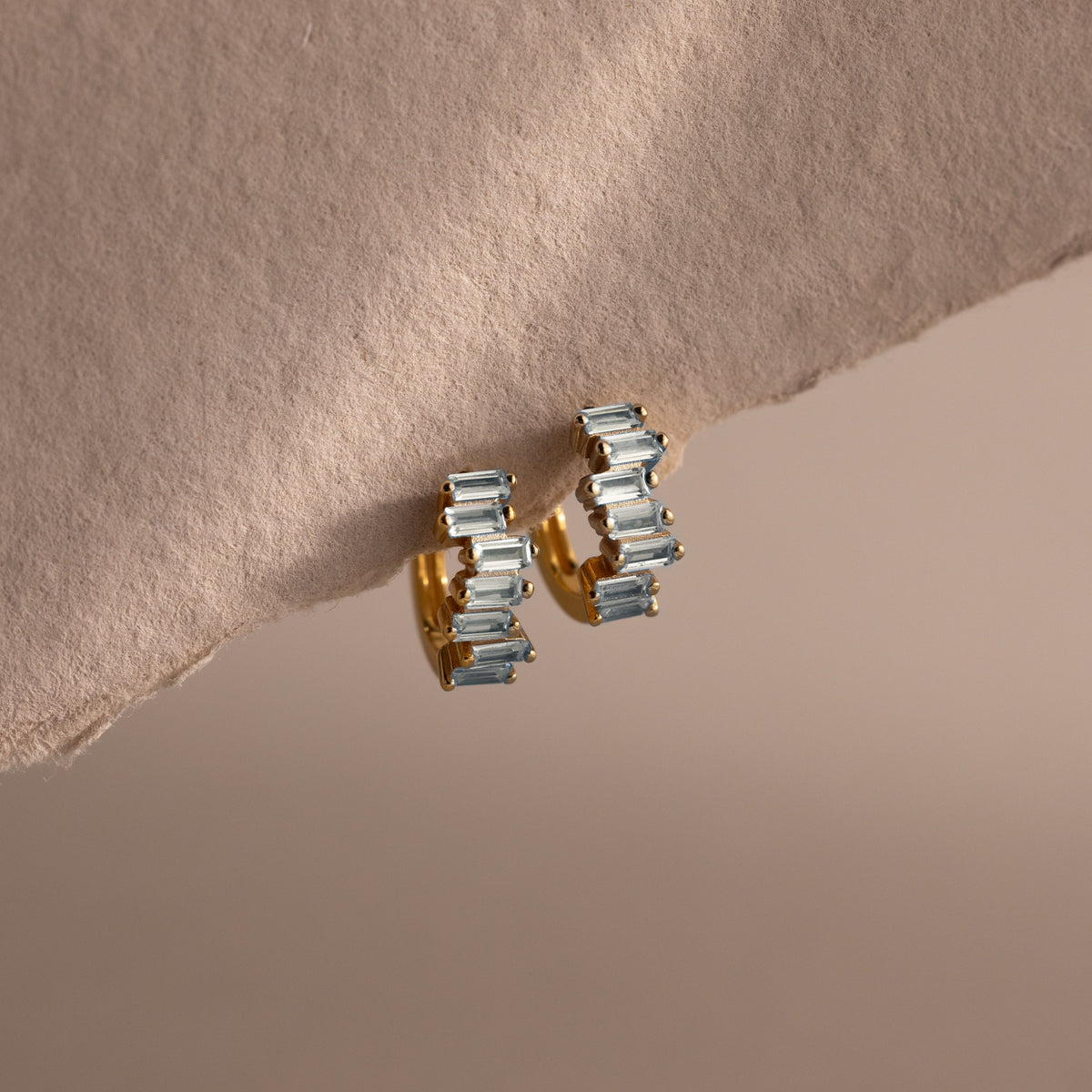 Staggered baguette birthstone huggies