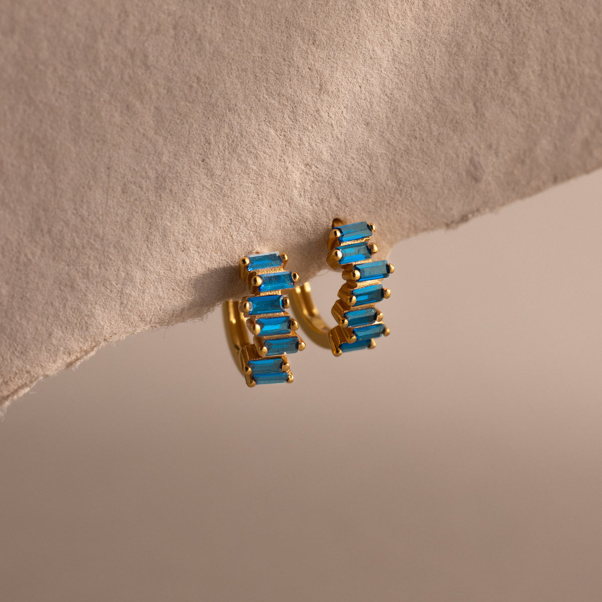 Staggered baguette birthstone huggies