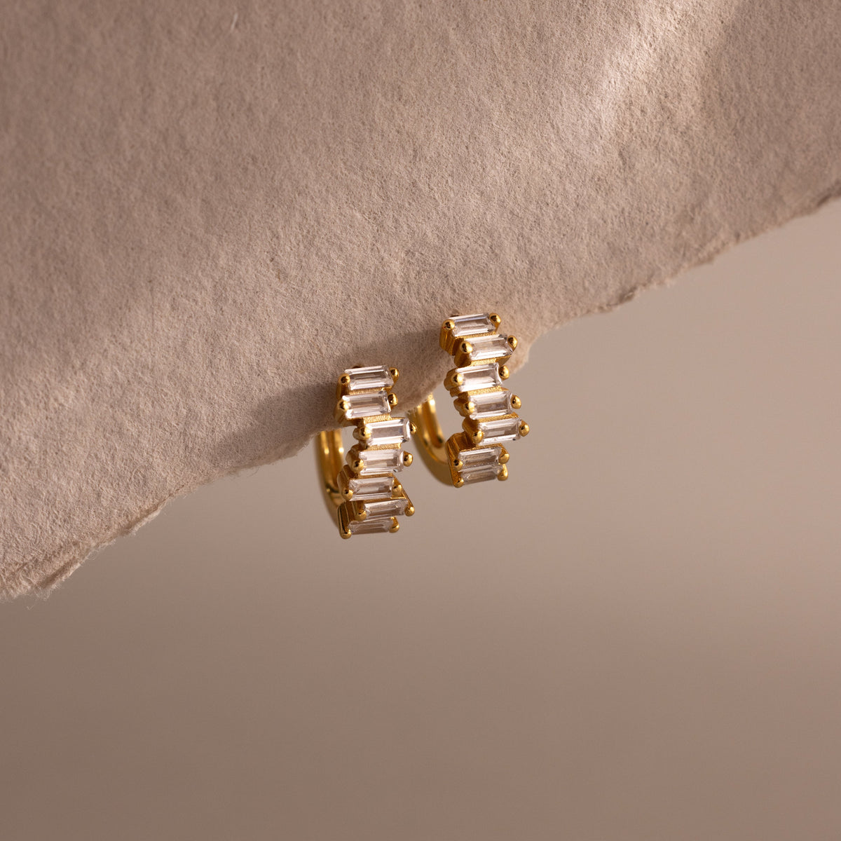 Staggered baguette birthstone huggies