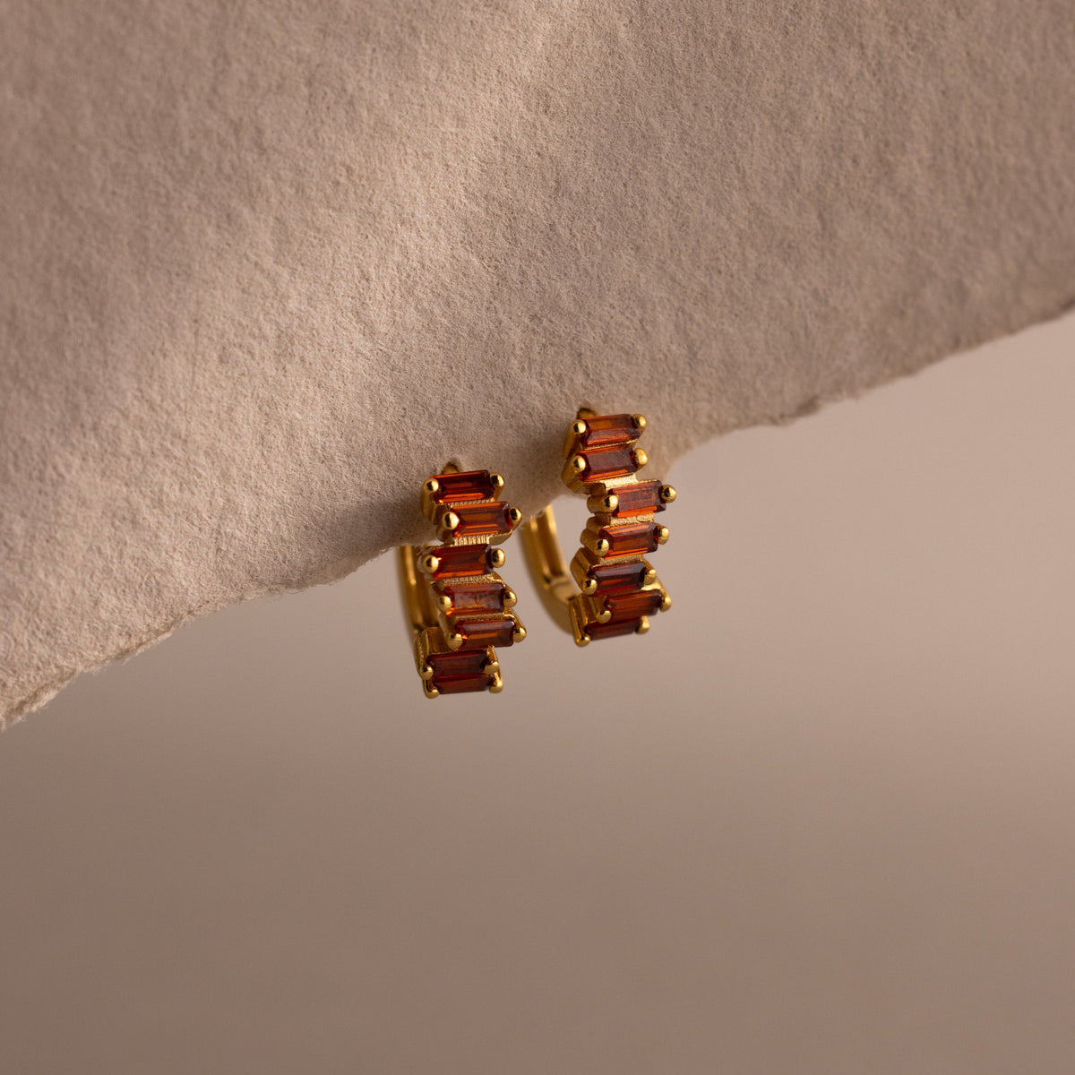 Staggered baguette birthstone huggies