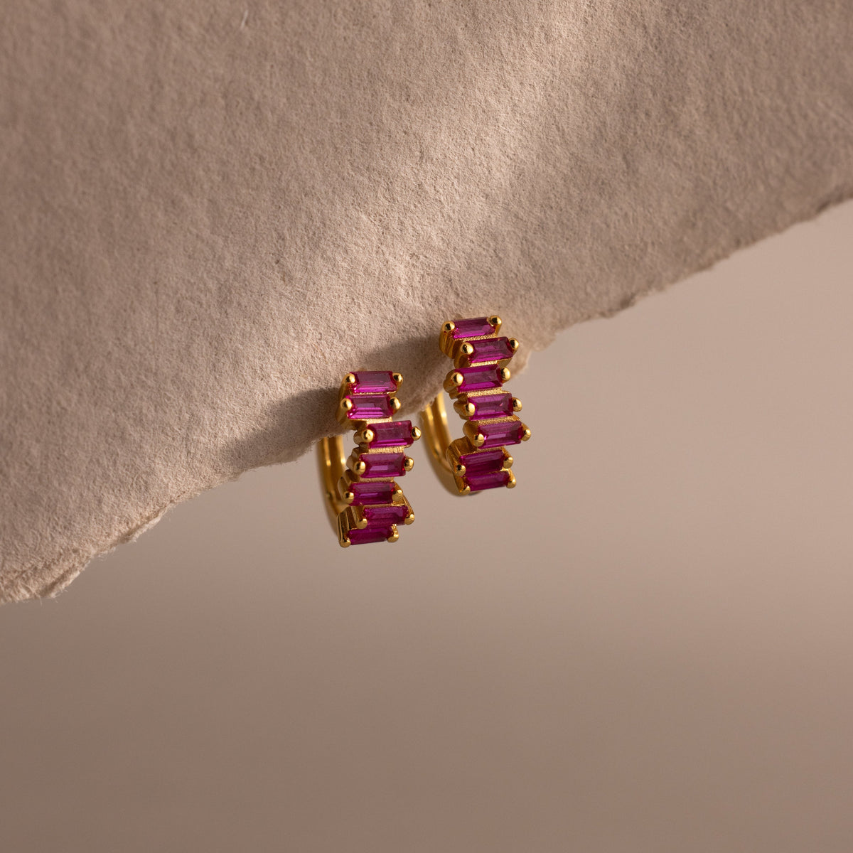 Staggered baguette birthstone huggies