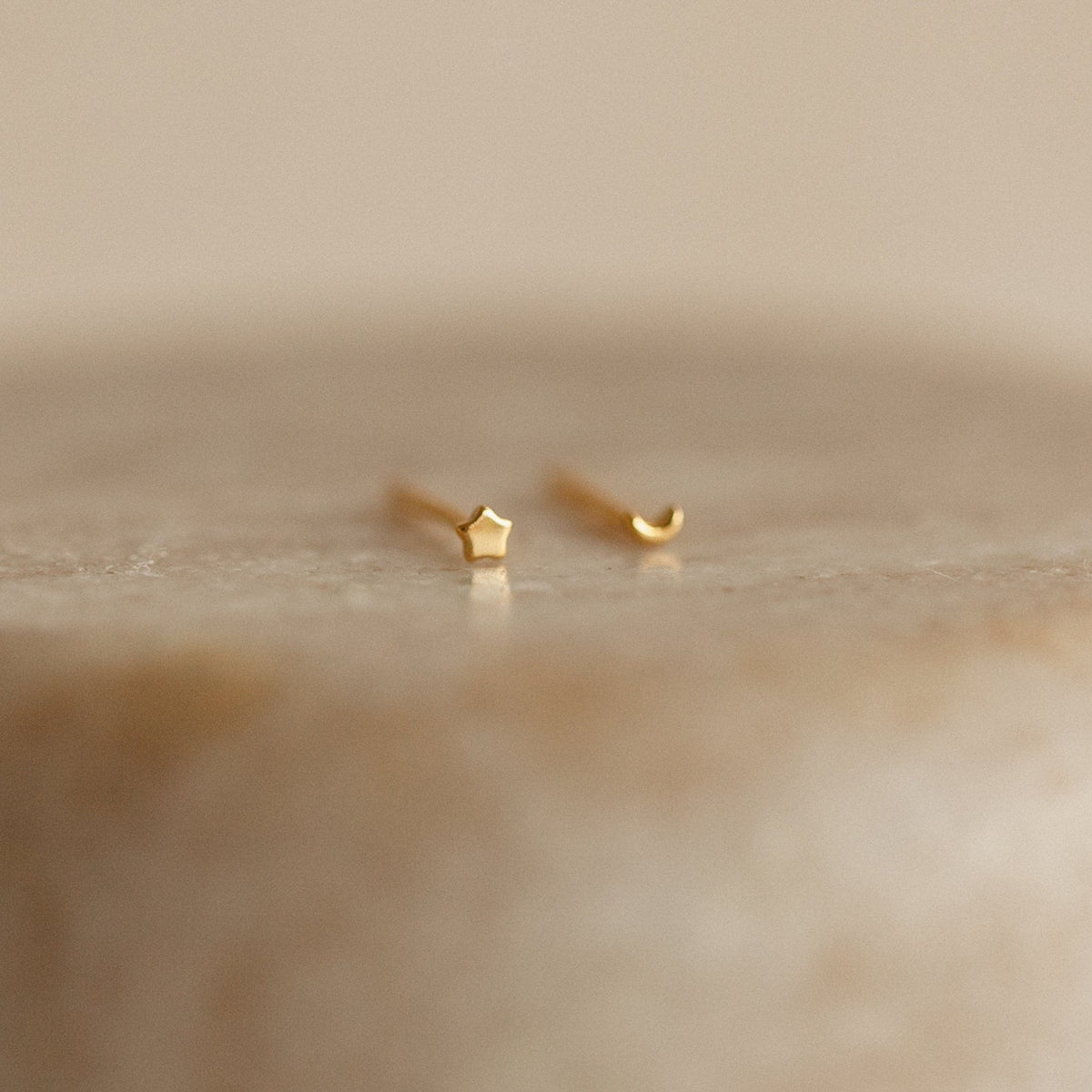 Tiny moon & star studs 1