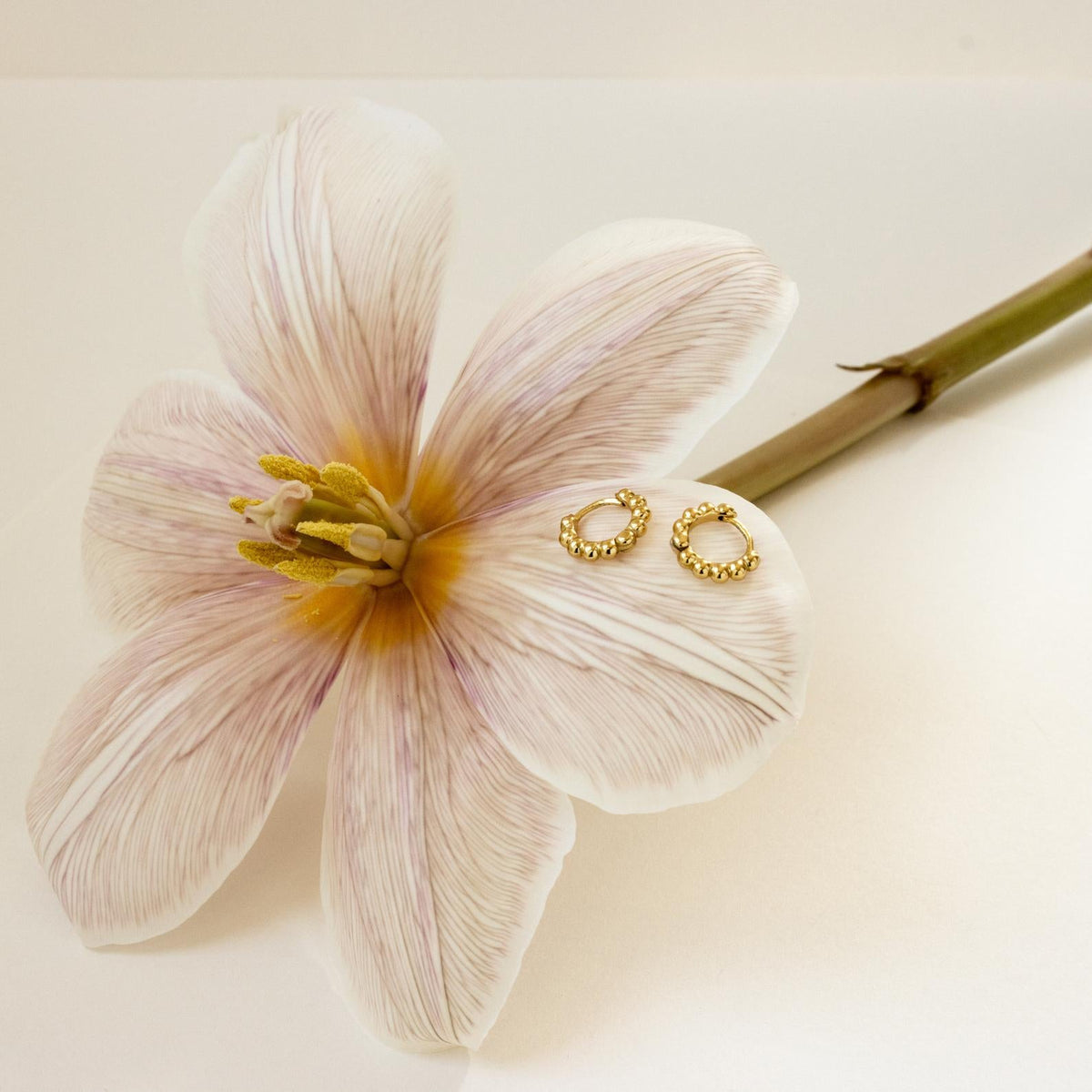 Dainty sphere beaded huggies