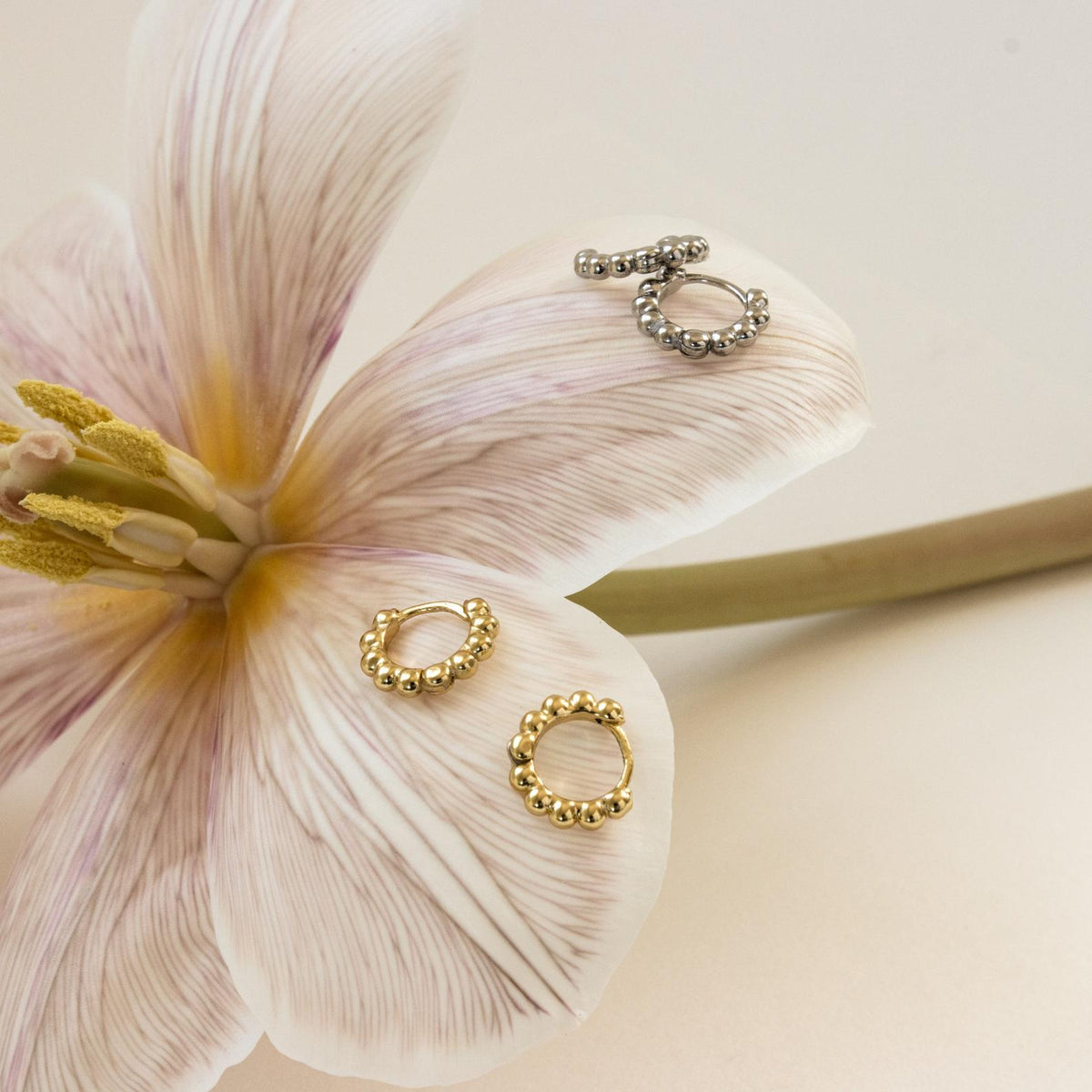 Dainty sphere beaded huggies