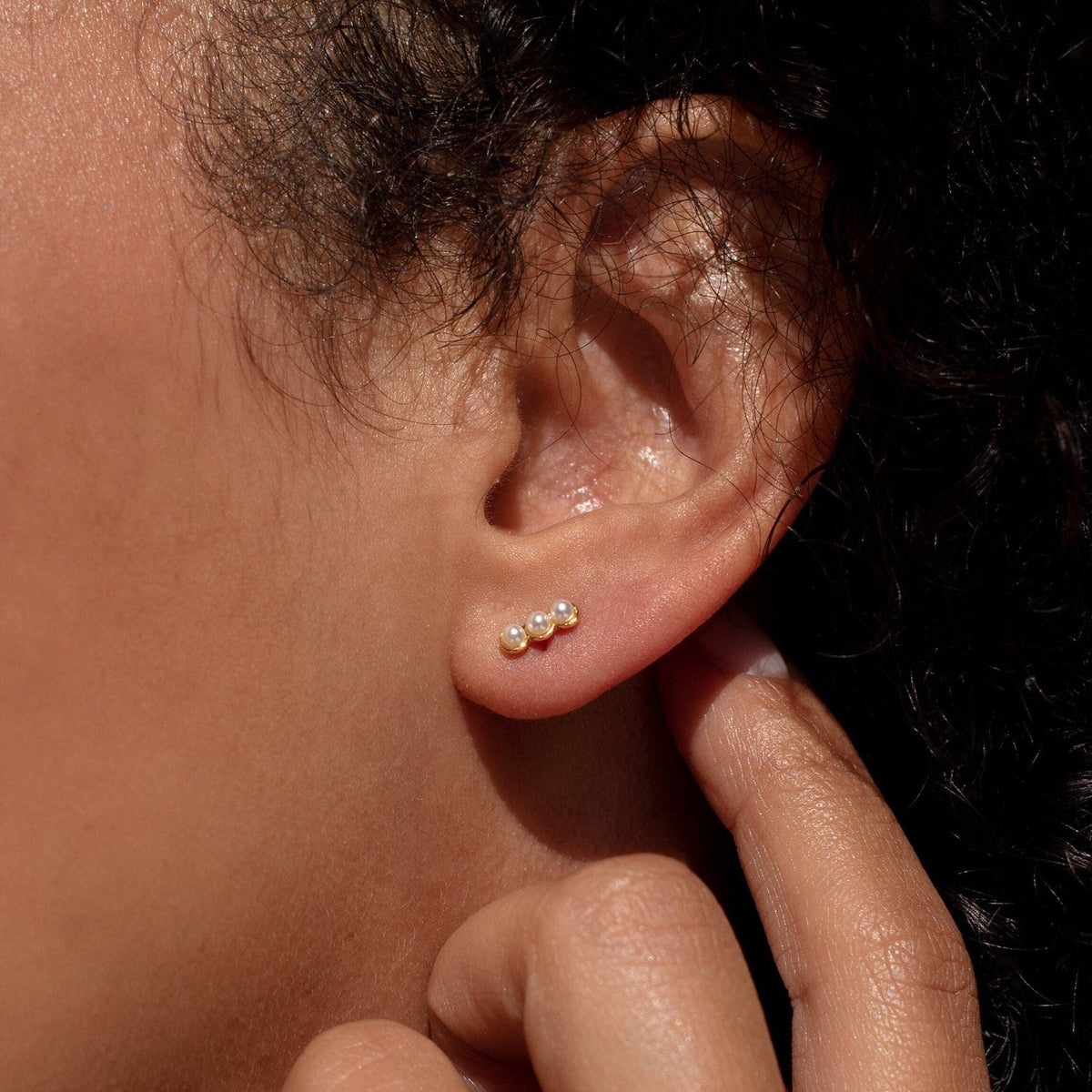 Tiny pearl bar studs