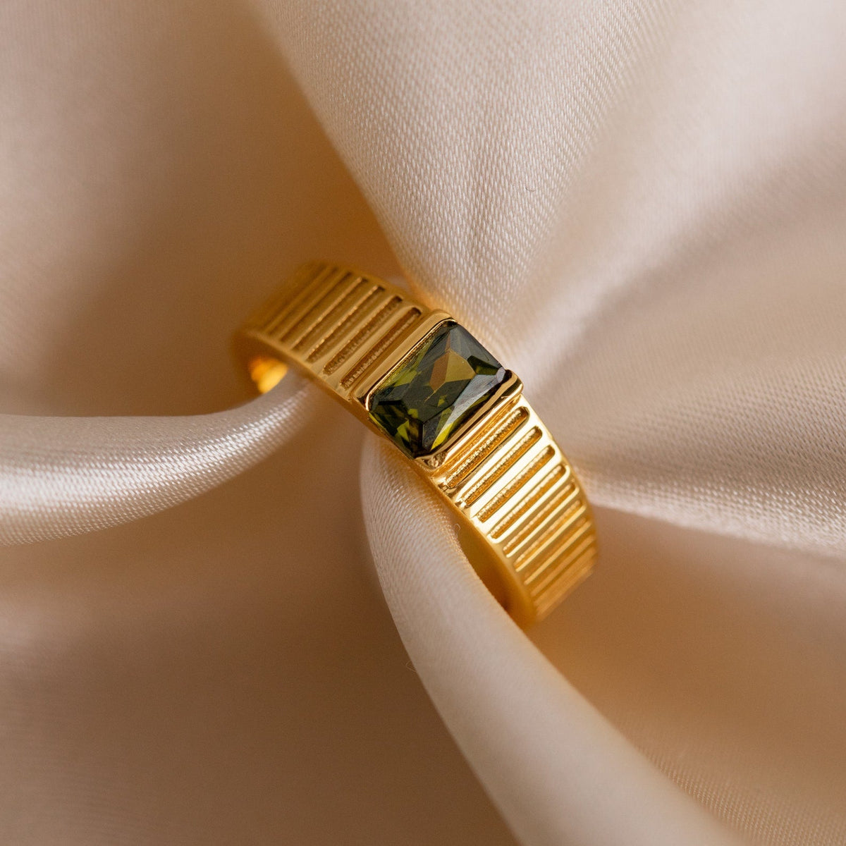 Olive peridot signet ring