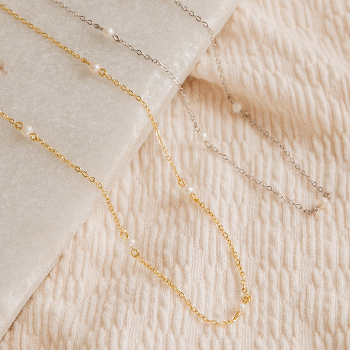 Dainty pearl station necklace