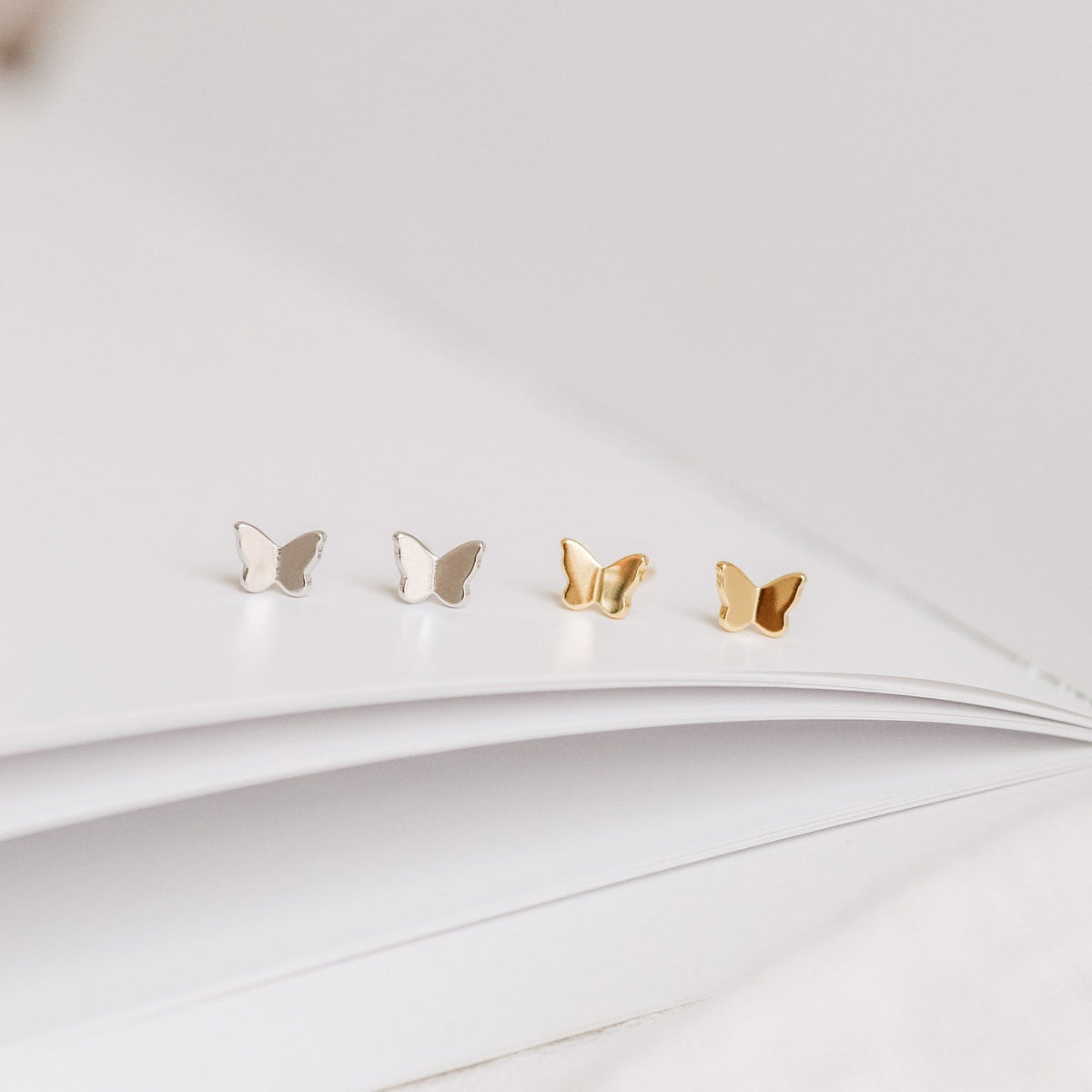 Emilia butterfly studs
