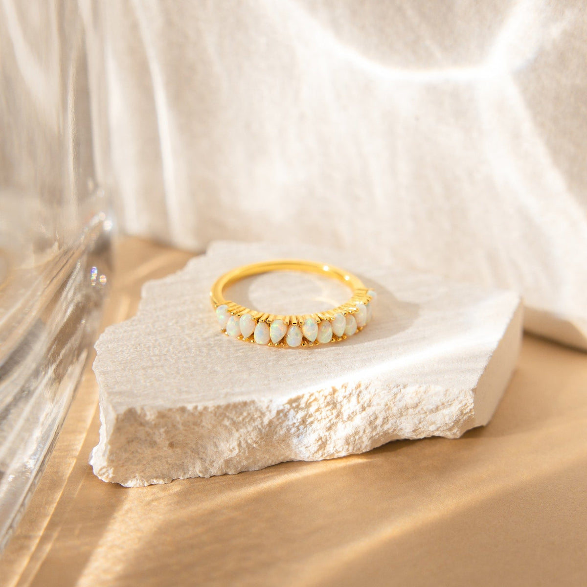 Opal drop eternity ring