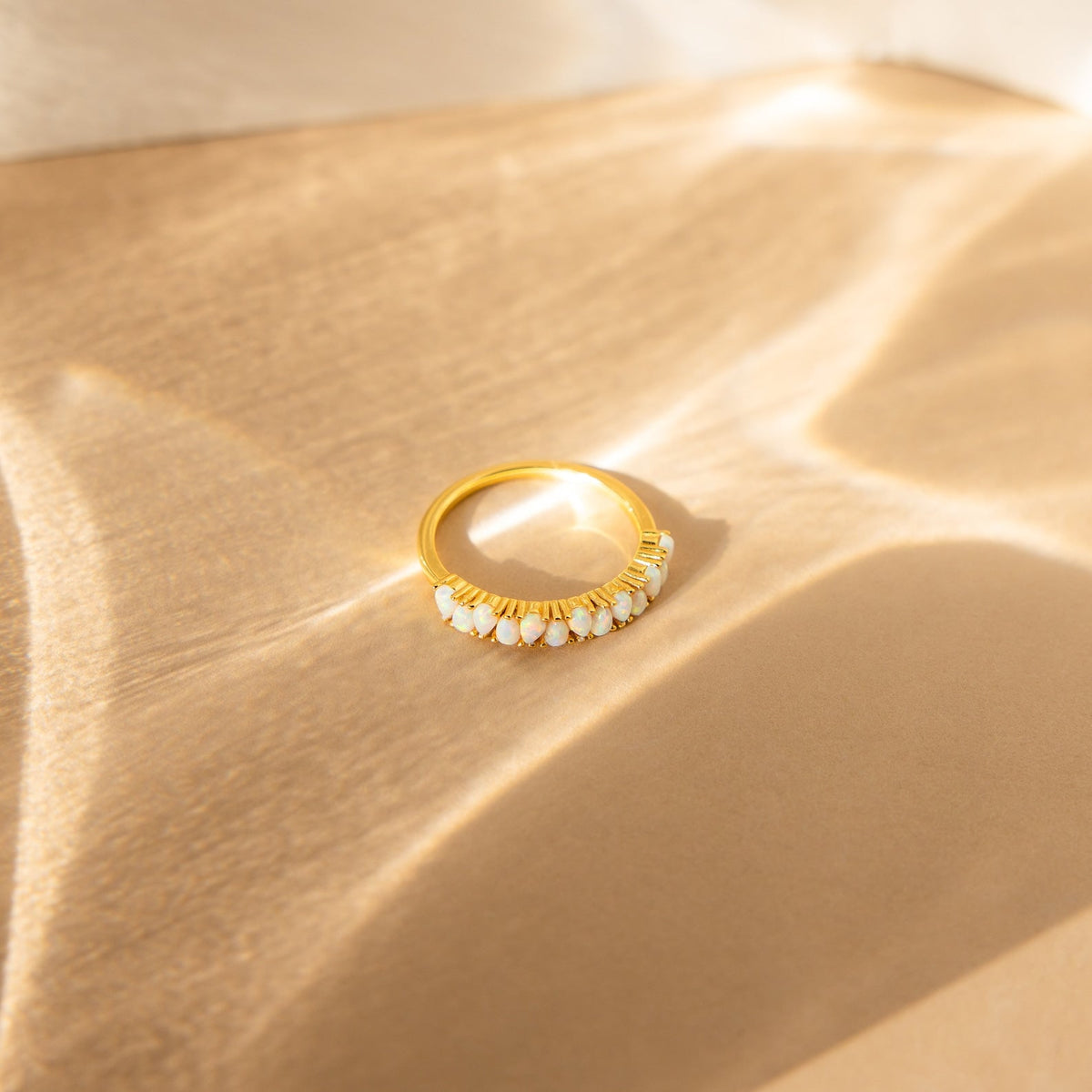 Opal drop eternity ring