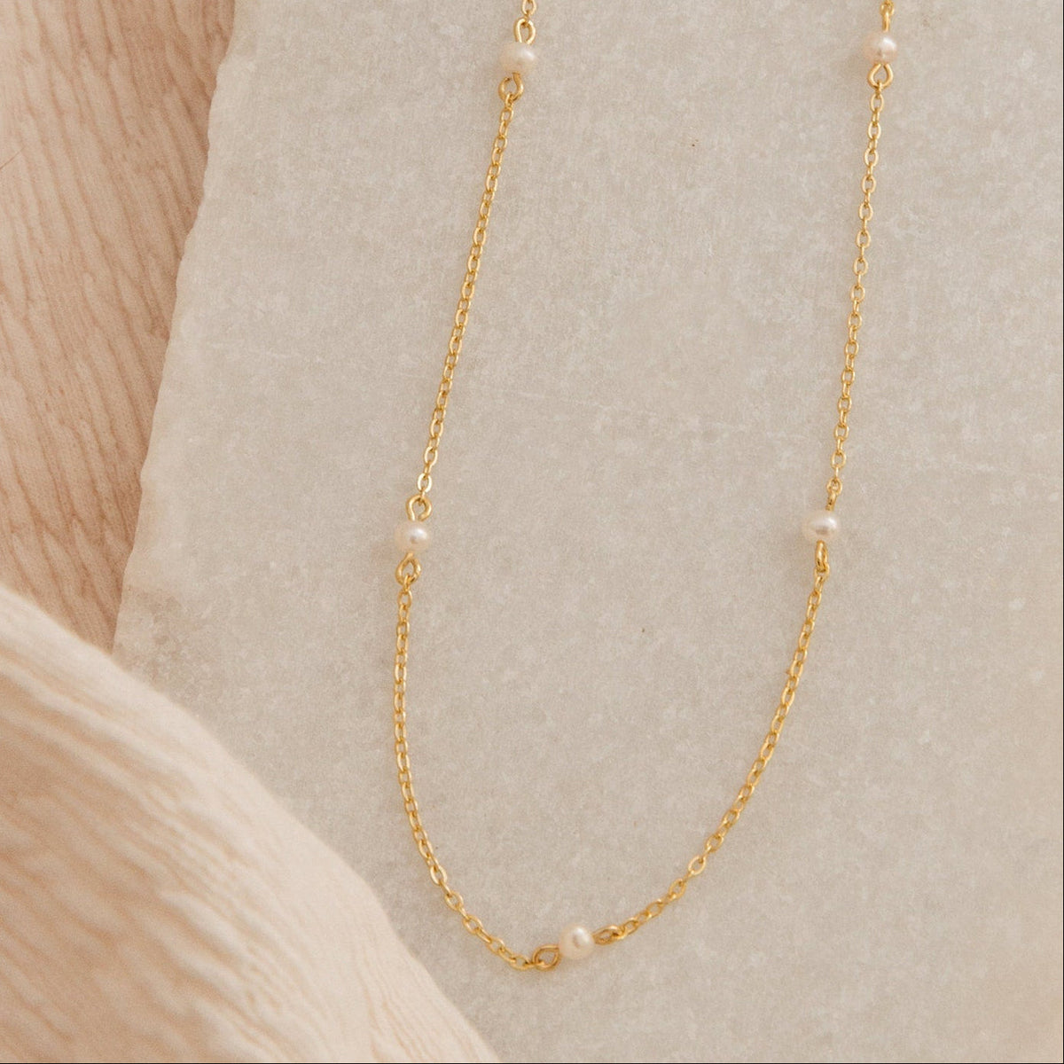 Dainty pearl station necklace