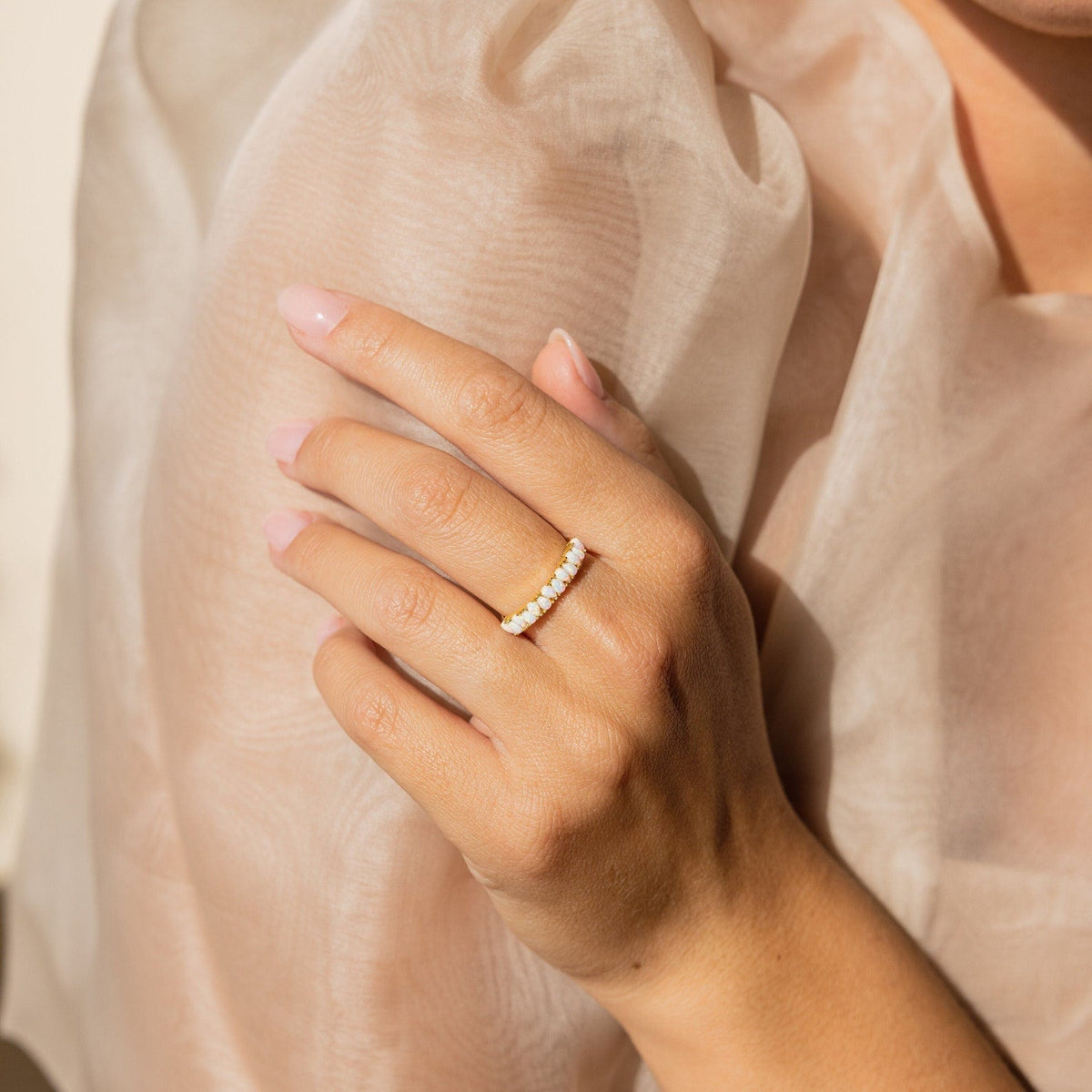 Opal drop eternity ring
