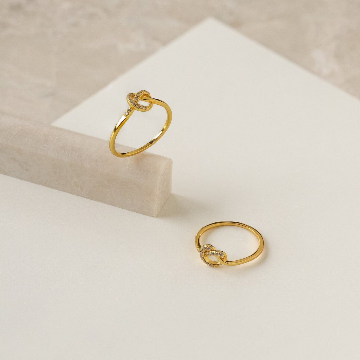 Pave heart knot ring