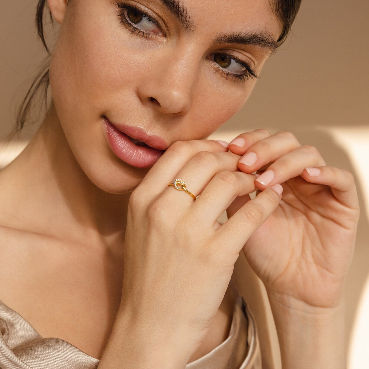Pave heart knot ring