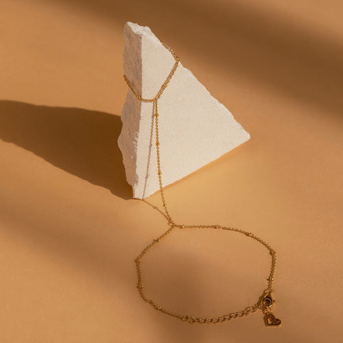 Beaded hand chain bracelet