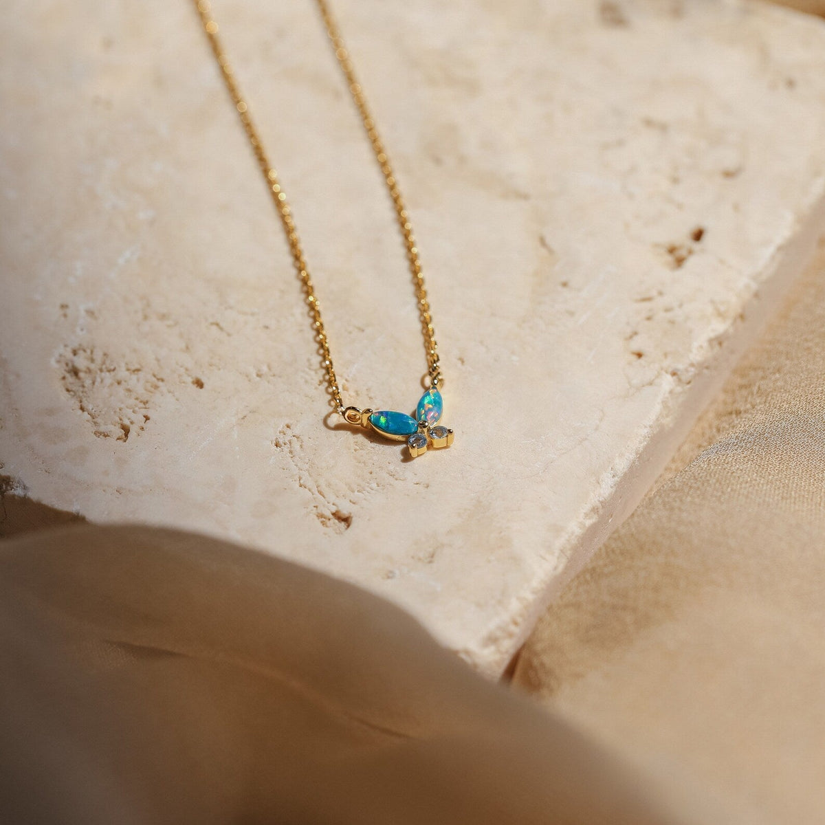 Blue opal butterfly necklace
