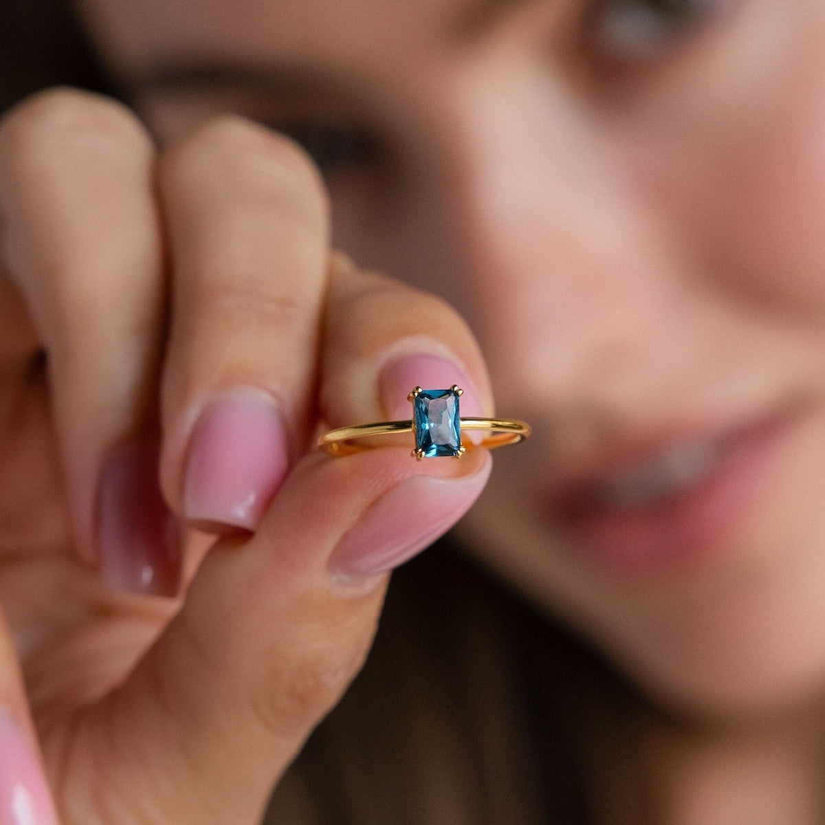 Blue topaz emerald-cut ring