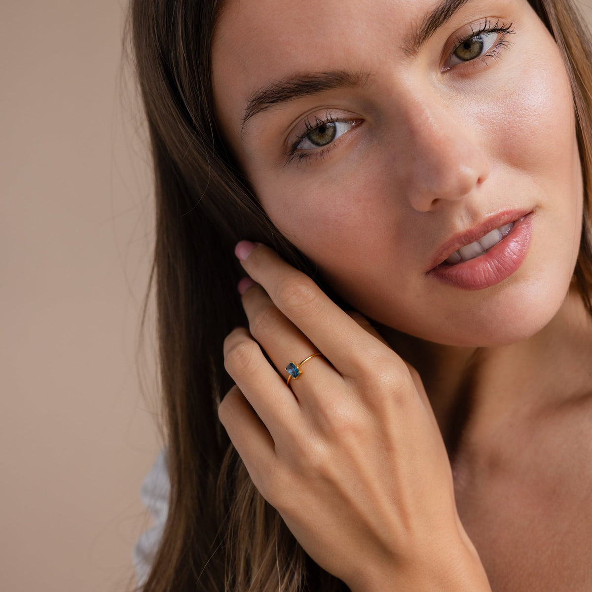 Blue topaz emerald-cut ring
